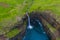 Mulafossur waterfall aerial drone view in Gasadalur, Vagar