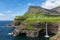 Mulafossur waterfall in Gasadalur village in Faroe Islands, North Atlantic Ocean. Nordic Natural Landscape