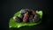 Mulberry berry with leaf isolated on black background