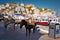 Mules waiting for tourists in the port of Hydra island