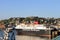 Mull ferry in Oban harbor with McCaig\'s Tower