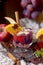 Mulled wine with fruits and citrus, tasty winter drink. Vitamins and beautiful fruits.