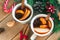 Mulled wine. Traditional Christmas and winter drink with red wine, citrus and spices and Christmas decorations