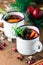 Mulled wine in white rustic mugs
