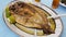 Mullet - open roasted fish lemon dish