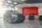 Multi-brand car dealership. Blur the background of the car and Showroom at blurred in workplace