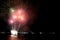 Multi-color fireworks splashing in the night sky