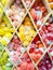 Multi-colored balls of wool yarn in the shelves of the store accessories for haberdashery, knitting and hobbies. Skeins of thread