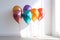 Multi-colored baloons on a white background. Isolated. Holiday. Birthday