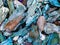 Multi-colored brown-blue and turquoise pieces of bark mulch beds use natural pine mulch. . Close for background