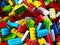 Multi colored building blocks background. 3D illustration