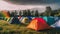 Multi colored dome tent in tranquil meadow, perfect for autumn camping generated by AI