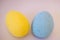 Multi-colored eggs made of polystyrene, Easter decor for studios made of polystyrene foam on a white background .