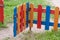 Multi-colored fence strips and wickets