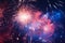 Multi colored fireworks salute new year 2024 magic night bright light effects show illuminated holiday celebrate