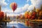 Multi-colored hot air balloon over the river and autumn forest