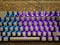 Multi-colored keyboard. mechanical keys. Multi-colored professional gaming mechanical rgb keyboard on the table background