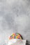 Multi colored lollipop covered medical mask top view flat lay copy space