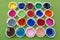Multi colored paint pot lids