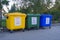 Multi-colored plastic containers for separate waste collection