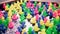 Multi-colored plastic ducks swim in the play pool. Background video.