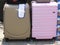 Multi-colored plastic suitcases for carrying things