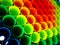 Multi colored plastic tubes background. 3D illustration