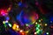 Multi-colored rainbow Christmas ball. New Year, Christmas, festive background
