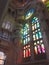 Multi-colored stained glass windows and beautiful architecture in Barcelona Spain church