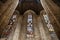 Multi-colored stained glass windows on the walls of the Duomo. Italy, Milan