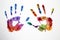 Multi-colored watercolor handprints