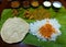 Multi-cuisine Andhra meals thali served on a banana leaf