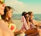 Multi ethnic friends sunbathing on a beach