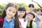 Multi-ethnic group of schoolchildren in park