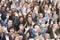 Multi Ethnic People Raising Hands Together