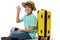 Multi-ethnic teenage boy in blue t-shirt and straw hat with suitcase and boarding pass, OK sign looking at camera