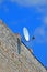 multi-feed satellite antenna with multiple feeds (converters) on the building roof, telecommunication diversity,