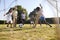 Multi generation black family playing football in a garden