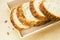 Multi-grain bread on wooden tray