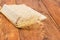 Multi-grain crispbread with wheat ears on wooden surface closeup