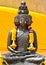 Multi headed metallic buddha staue