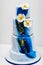 Multi level blue wedding cake with flowers