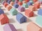 Multi Pastel Colors Studio Shot Miniature or Rainbow Jigsaw Blocks Houses Background for Card, Poster or Web Banner.