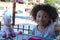 Multi Racial tween girl with stuffed animal smiling