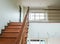 multi step wooden stair in new house building. brown color iron Handrail decor interior estate