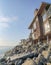 Multi-storey accommodation buildings near the rocky shoreline of Oceanside in California