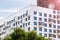 Multi-storey residential building with balconies. Modern apartments