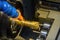 The multi tasking CNC lathe machine swiss type drilling the brass fitting parts