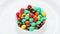 Multicolor bonbon sweets (ball candies) rotating