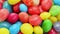 Multicolor bonbon sweets rotating food background